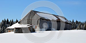 Winter landscape old farm in country side of Bromont