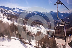 Winter landscape - Panorama of the ski resort with ski slopes and ski lifts. Alps. Austria. Karnten