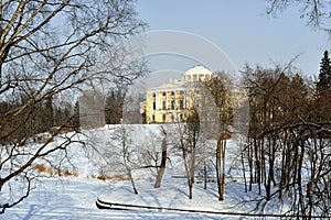 Winter landscape of the Pavlovsk garden and palace.