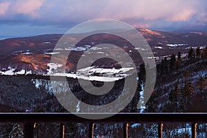 Winter landscape in the Polish mountains of the Sudetes, a panorama from the Klodzka Gora observation tower to the Snieznik Massif