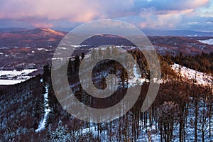 Winter landscape in the Polish mountains of the Sudetes, a panorama from the Klodzka Gora observation tower to the Snieznik Massif