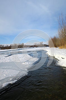 Winter landscape with river