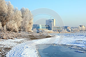 Winter landscape. River-boat station.