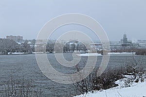 Winter landscape. River lake without ice swamp plants neg. winter entertainment. Plants in the snow photo