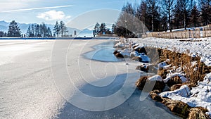 Winter landscape with river and snow in Crans Montana in Switzerland. Tranquil scene