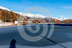 Winter landscape with river and snow in Crans Montana in Switzerland. Tranquil scene photo