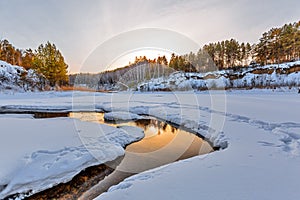 Winter landscape with a river. Western Siberia