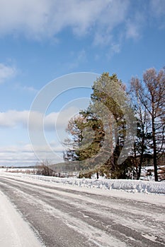 Winter landscape with a road