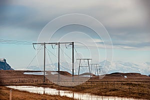 Winter landscape, Skeidararsandur, Southern Iceland. Hydro electric power lines stretch towards distant snow covered mountains