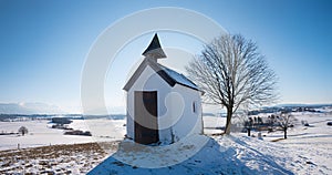 Winter landscape with small chapel, lookout and meditation place Aidling, Riegsee, upper bavaria