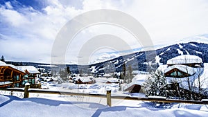 Winter Landscape with Snow Covered Roofs in the Alpine Village of Sun Peaks