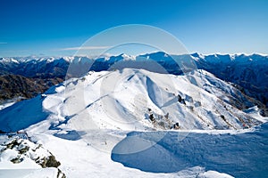 Winter landscape of snow mountain against blue sky in South island, New Zealand