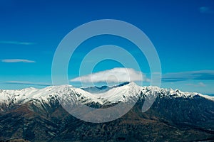 Winter landscape of snow mountain against blue sky in South island, New Zealand