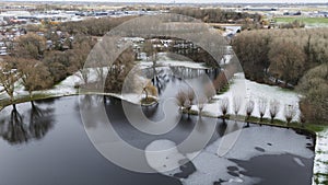 winter landscape with snow in netherlands made by a drone