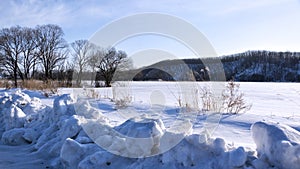 Winter landscape with snowy field