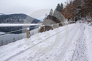 Winter landscape at Soesetalsperre in Harz Mountains National Park, Germany. Moody snow scenery in Germany