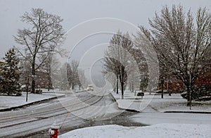 Winter landscape street of a small town snow covered pavement Canada USA