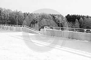 Winter landscape. Street, stairs, roll, trees.