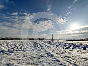 Winter landscape and sun in Maramures, Romania