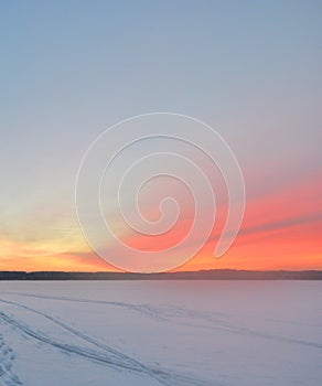 Winter landscape at sunset.