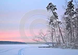 Winter landscape at sunset.