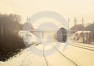Winter landscape with train in color sepia