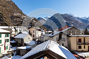 Winter landscape of a typical Swiss village with snow