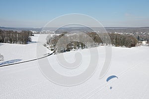 Winter landscape under snow seen from the sky in ÃŽle-de-France