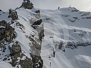 Winter landscape view at the cable car to mount Titlis over Engelberg in the Swiss alps