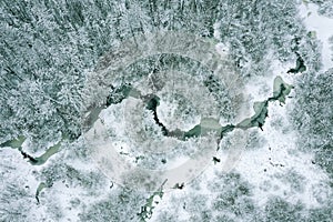 Winter landscape. winding river and forest covered with snow. aerial view