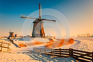 Winter landscape with windmills in Schermerhorn Netherlands