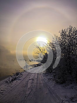 Halo Icebow or gloriole. winter landscape. winter snow day. the sun is a halo. halo.