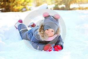 Winter little child playing having fun