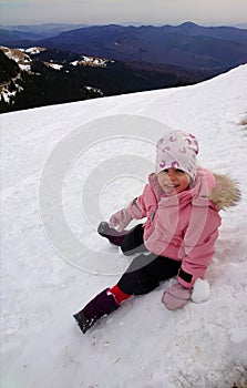Winter love - girl enjoying the mountain landscape