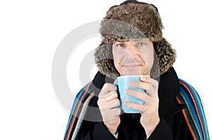 Winter. Man drinking hot coffee.