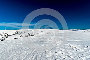 Winter Martinske hole with Krizava and Velka luka hills and Tatra mountains on the background in Slovakia