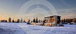 Winter meadow with bee hive