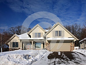 Winter in Minnesota with residential house