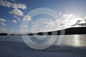 Winter mood and large frozen water surface photo