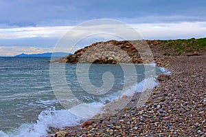 Winter morning landscape of empty Glyfada Beach in Athens. Saronic Gulf. Famous public beach. Natural composition