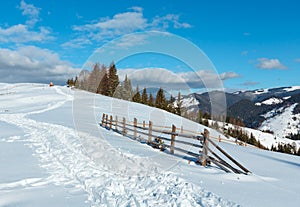 Winter morning mountain rural snow covered path