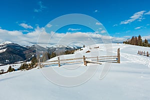 Winter morning mountain rural snow covered path