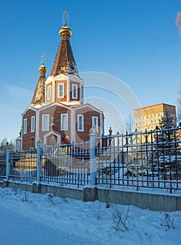 Winter morning in Siberia. Orthodox church in the city of Seversk.