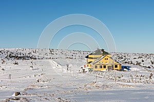 Winter morning, Silesian house, located at the foot of Snezka, krkonose mountains. Snezka is mountain on the border between