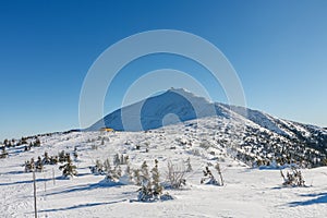 Winter morning, Silesian house, located at the foot of Snezka, krkonose mountains. Snezka is mountain on the border between