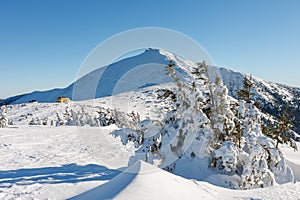 Winter morning, Silesian house, located at the foot of Snezka, krkonose mountains. Snezka is mountain on the border between