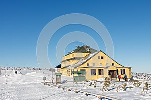 Winter morning, Silesian house, located at the foot of Snezka, krkonose mountains. Snezka is mountain on the border between Czech