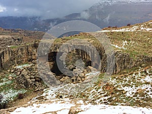 Winter in Mount Lebanon. View of kfardebiane natural bridge with mountains in background  snowy natural  landscape