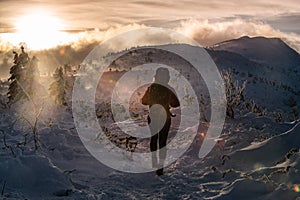 Winter Mountain Hiking - Backpacker Woman on the Babia Gora Trail in Beskidy Mountains Poland