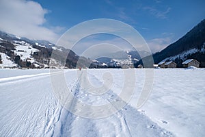 Winter mountain landscape with groomed cross-country trails